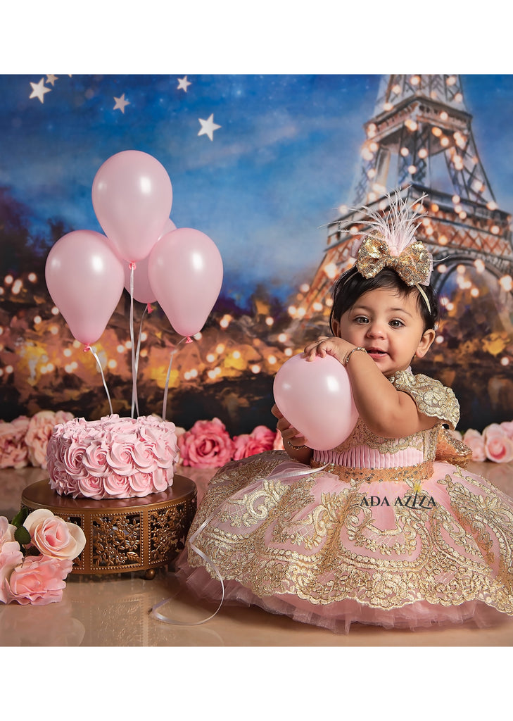 Baby girl wearing Esmeralda Dress Pink Short